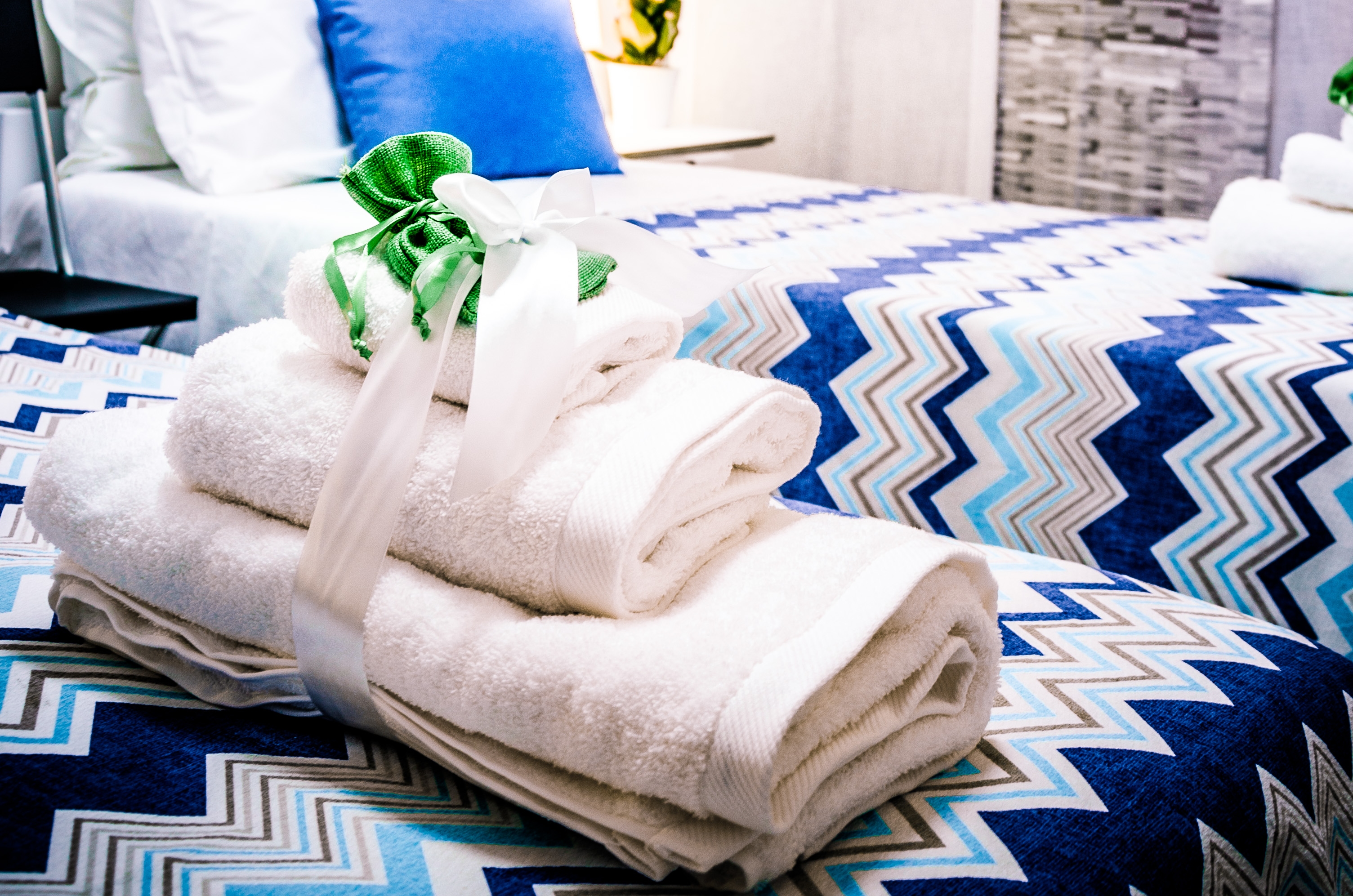 White towels folded on the beds